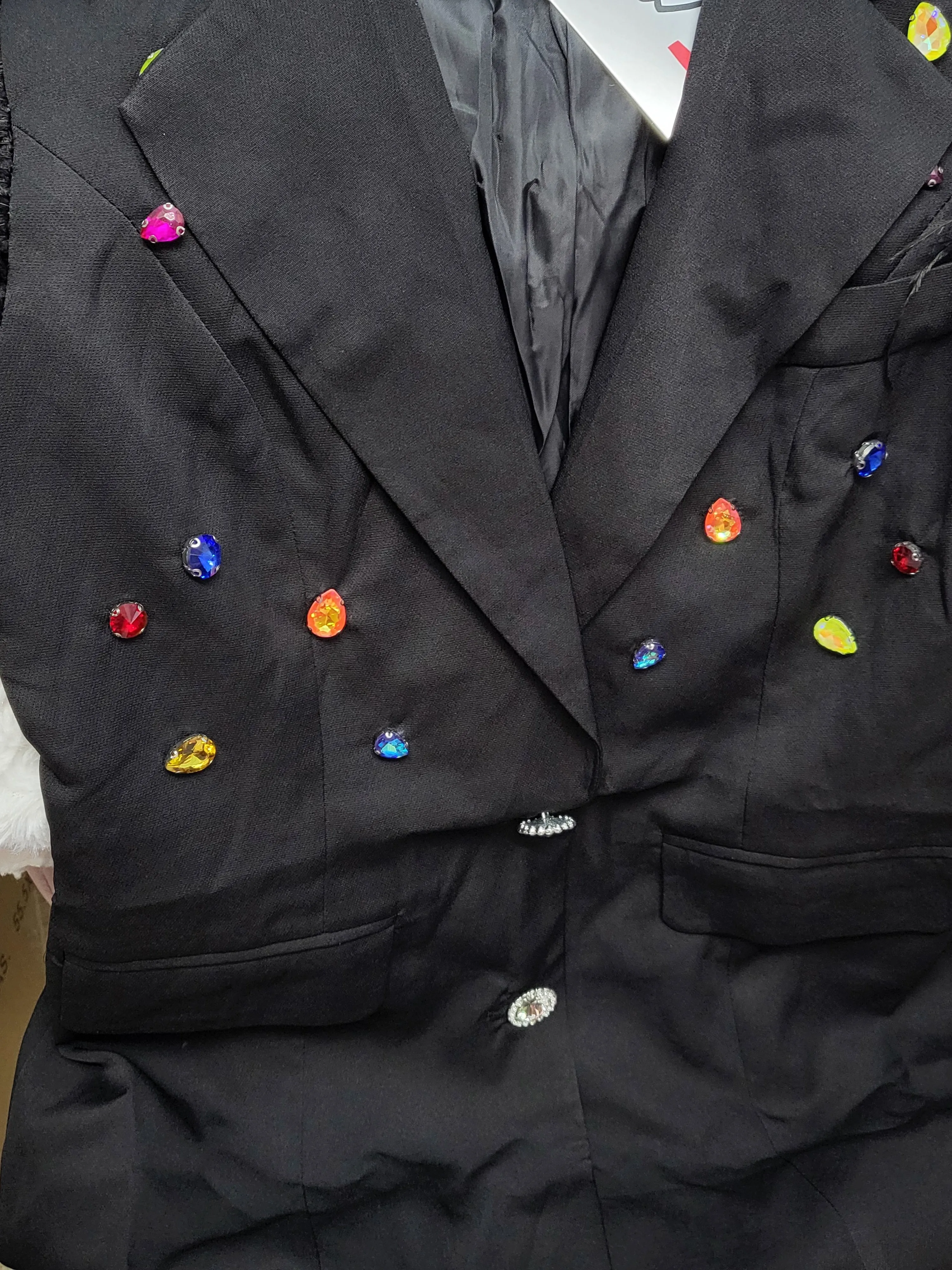 Sleeveless Feather Blazer